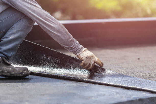 Professional Exterior Waterproofing technician working in Highland, IL
